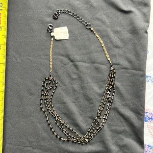 Black and gold beaded necklace. Broken clasp
